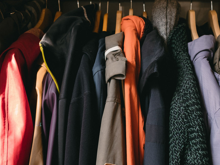 Winter clothing and coat hanger hi-res stock photography and